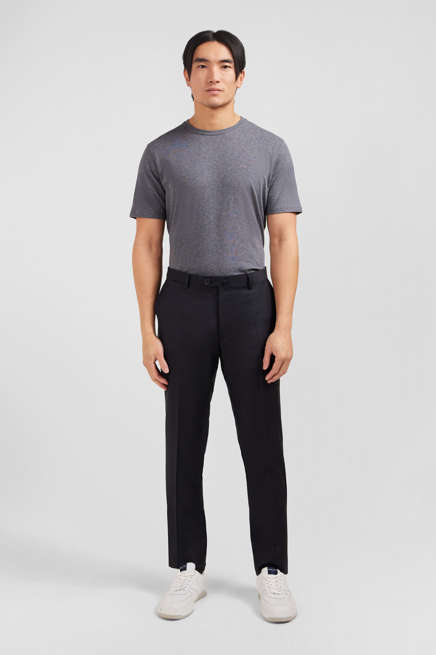 Slim dark grey wool trousers with broken fold