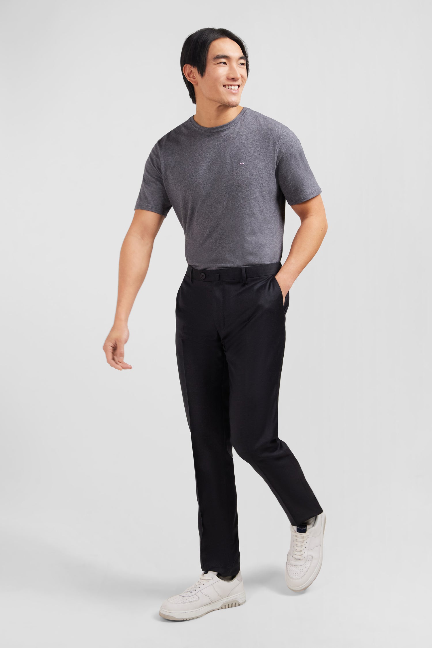 Slim dark grey wool trousers with broken fold