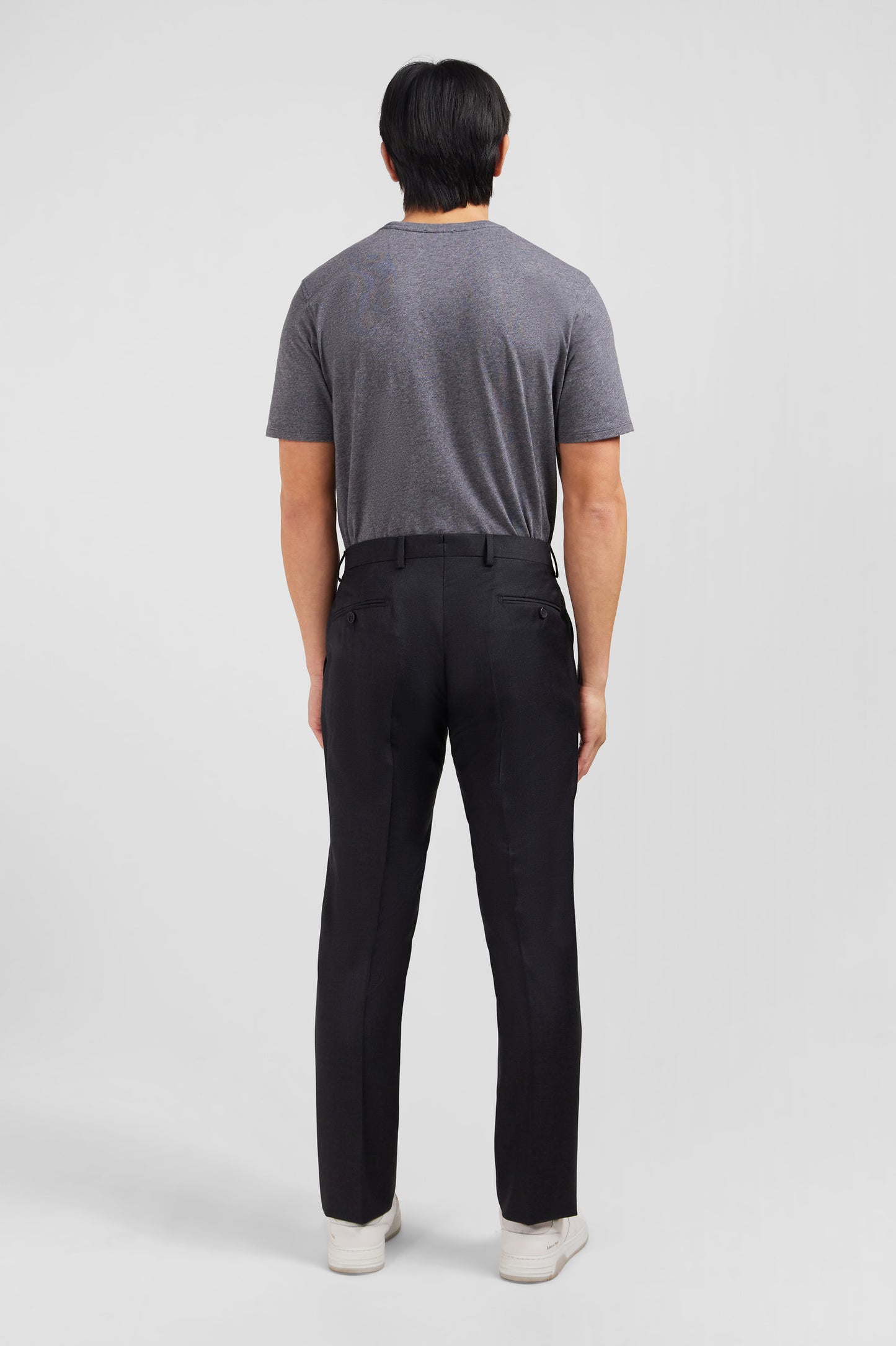 Slim dark grey wool trousers with broken fold