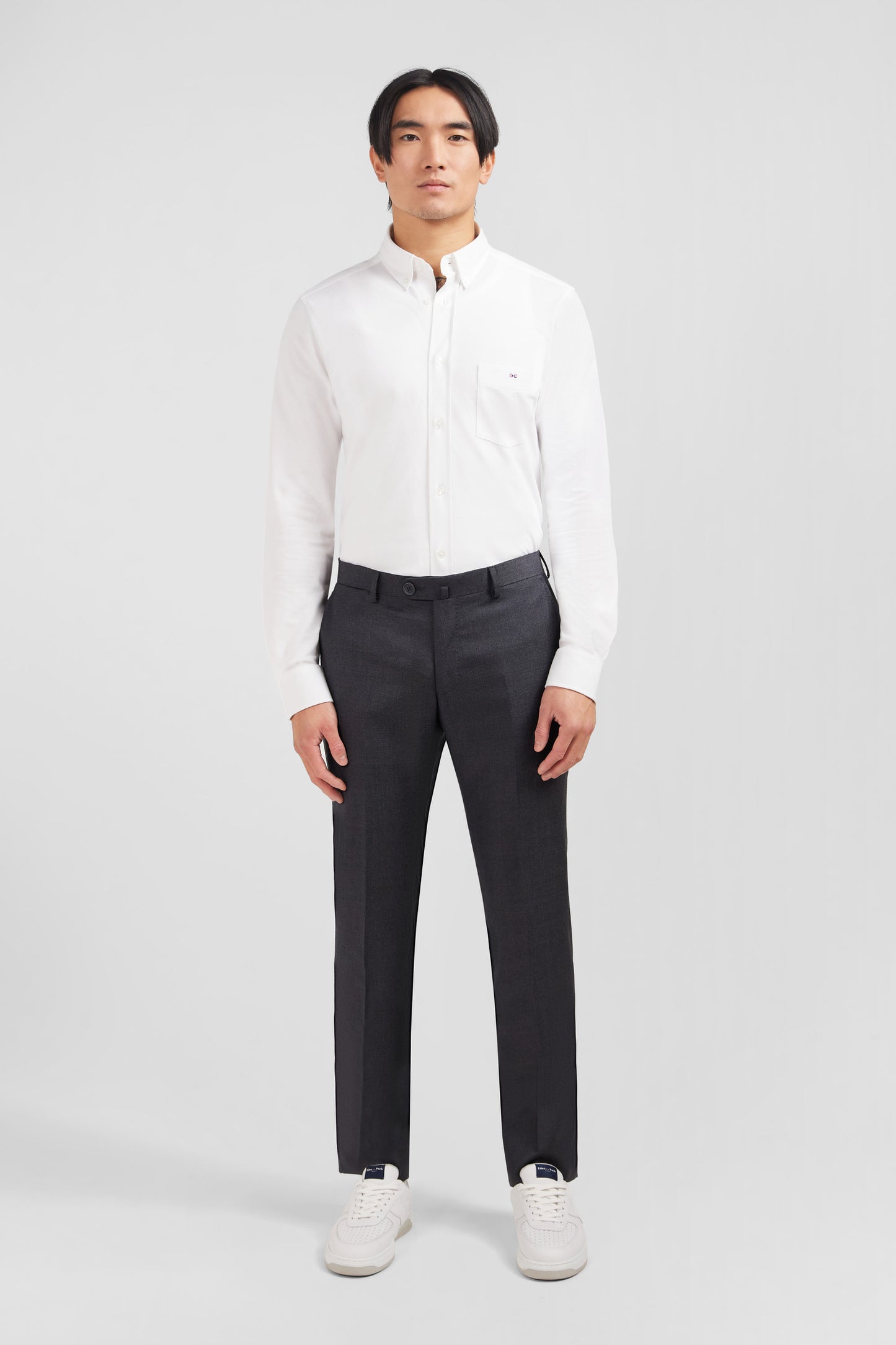 Slim grey wool trousers with broken fold