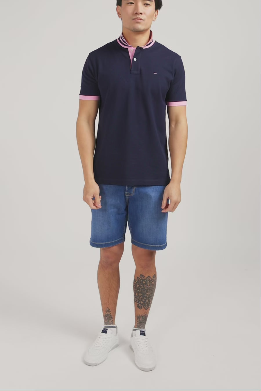 Navy blue pima cotton polo with contrasting accents