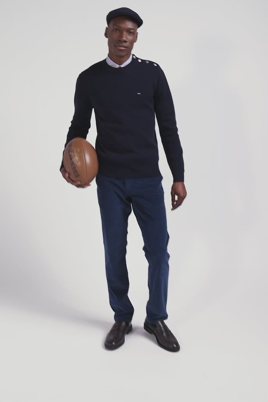 Regular navy blue crew neck jumper with shoulder buttons