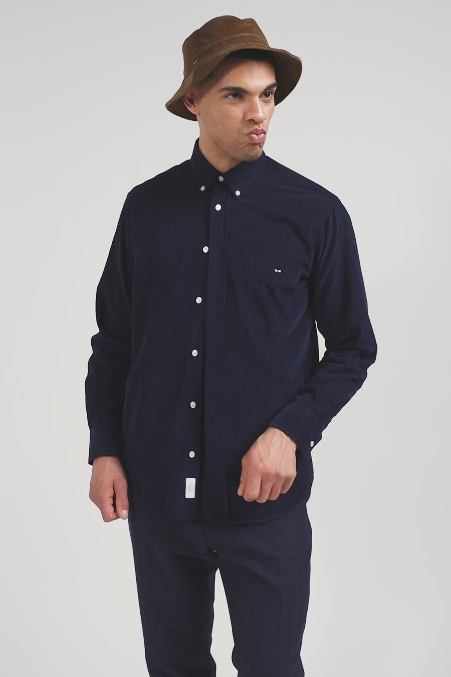 Regular plain navy blue cotton shirt with button-down collar and chest pocket