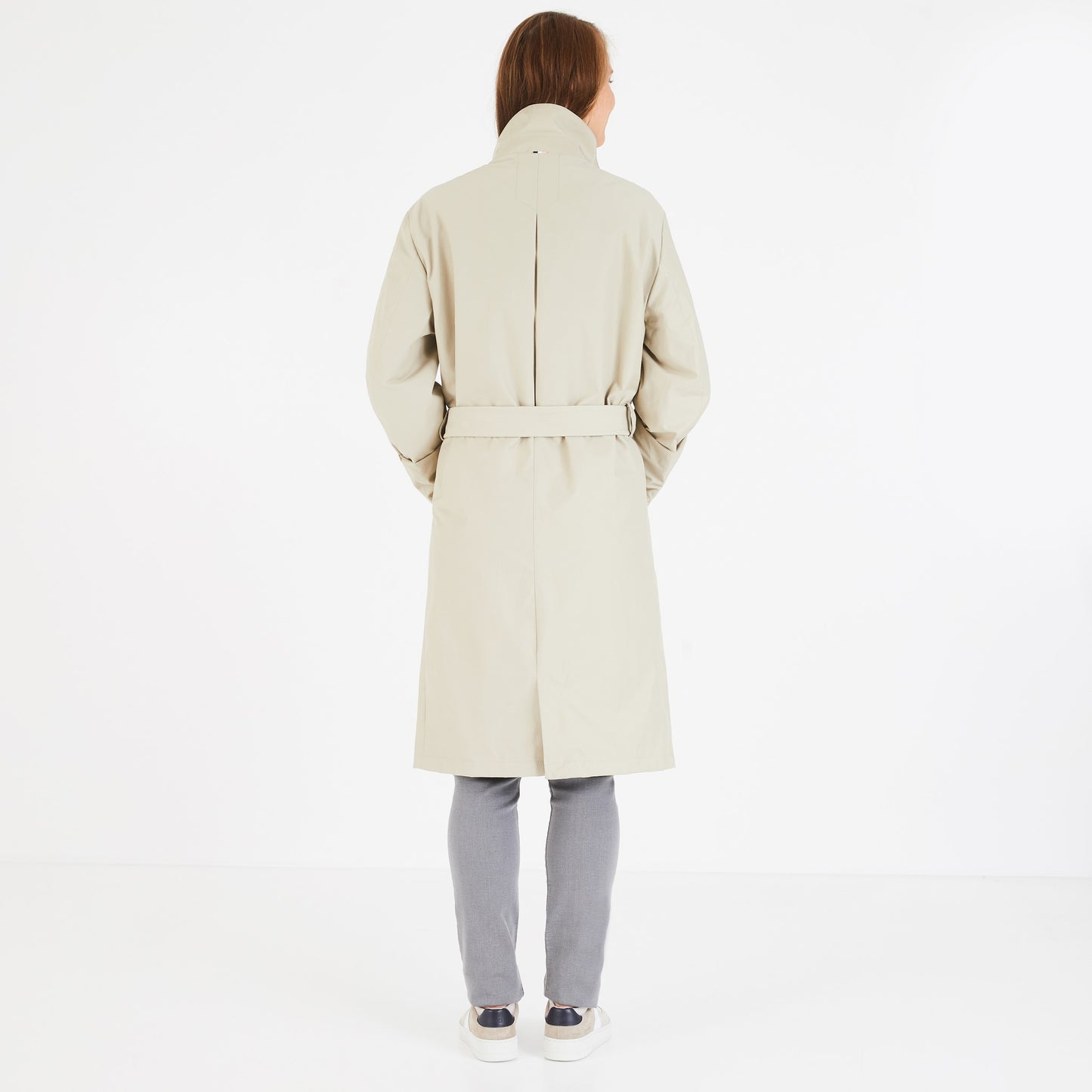 Beige raincoat with belt