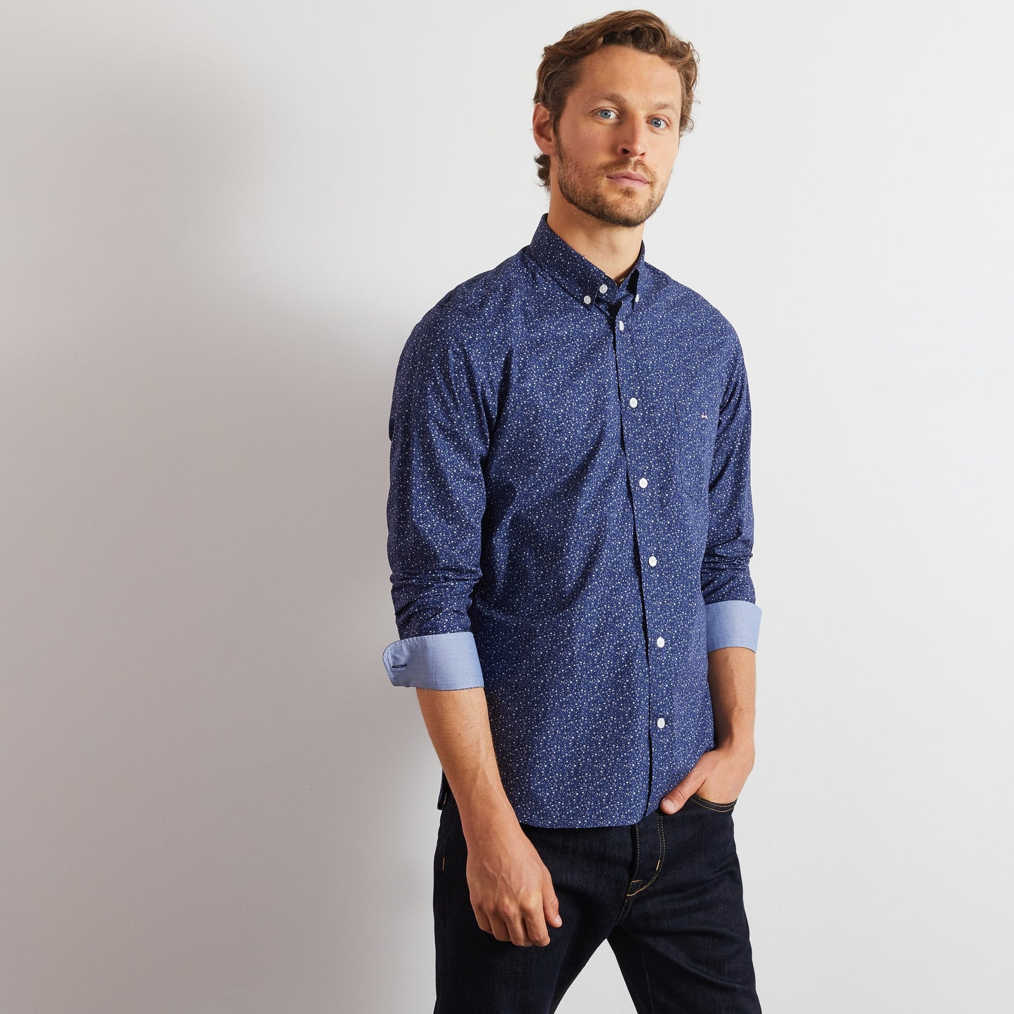 Navy blue shirt with a grey floral motif